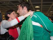 18 July 2011; Ireland's Brian Gregan, Silver Medalist in the Mens 400m, is greeted by his mother Marion on his arrival in Dublin Airport as the Irish Team return from the European Under 23 Championships in Ostrava. Dublin Airport, Dublin. Picture credit: Barry Cregg / SPORTSFILE