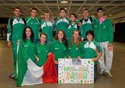 18 July 2011; Ireland's Brian Gregan, centre,  Silver Medalist in the Mens 400m, with team-mates. Back row from left, Declan Monaghan, Timmy Crowe, David Flynn, Chris Russell, Paul Robinson and Kourosh Foroughi. Front row, from left, Jessie Barr, Niamh Whelan, Kalyn Sheehan, Mairead Murphy and Sara Treacy on their arrival in Dublin Airport as the Irish Team return from the European Under 23 Championships in Ostrava. Dublin Airport, Dublin. Picture credit: Barry Cregg / SPORTSFILE
