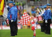 17 July 2011; A young flag bearer with the St. Michael's Band. Ulster GAA Football Senior Championship Final, Derry v Donegal, St Tiernach's Park, Clones, Co. Monaghan. Picture credit: Brian Lawless / SPORTSFILE