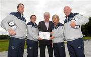 19 July 2011; Milo Corcoran, centre, former President of the Football Association of Ireland and founder of the Football Village of Hope with FAI coaches Ger Dunne, left, and Emma Martin, Sue Ronan, right, newly appointed Ireland senior Women's manager, and Dave Connell, Women's Under 19 team manager, in attendance at a photocall to announce details of the Football Village of Hope 2011. The Football Village of Hope is an Israeli-Palestinian football based peace building initiative that will host over 120 Israeli and Palestinian boys and girls from the Twinned Peace and Sport Schools program. Over the coming four weeks the 4 coaches from the Football Association of Ireland will accompany Football Village of Hope founder Milo Corcoran to Israel for this year's Football Village of Hope. FAI Headquarters, Abbotstown, Dublin. Photo by Sportsfile