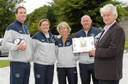 19 July 2011; Milo Corcoran, right, former President of the Football Association of Ireland and founder of the Football Village of Hope with FAI coaches Ger Dunne, left, and Emma Martin, Sue Ronan, right, newly appointed Ireland senior Women's manager, and Dave Connell, Women's Under 19 team manager, in attendance at a photocall to announce details of the Football Village of Hope 2011. The Football Village of Hope is an Israeli-Palestinian football based peace building initiative that will host over 120 Israeli and Palestinian boys and girls from the Twinned Peace and Sport Schools program. Over the coming four weeks the 4 coaches from the Football Association of Ireland will accompany Football Village of Hope founder Milo Corcoran to Israel for this year's Football Village of Hope. FAI Headquarters, Abbotstown, Dublin. Photo by Sportsfile