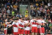 17 July 2011; The Derry players huddle before the match. Ulster GAA Football Senior Championship Final, Derry v Donegal, St Tiernach's Park, Clones, Co. Monaghan. Picture credit: Brian Lawless / SPORTSFILE