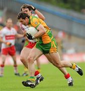 17 July 2011; Ryan Bradley, Donegal, in action against Charlie Kielt, Derry. Ulster GAA Football Senior Championship Final, Derry v Donegal, St Tiernach's Park, Clones, Co. Monaghan. Picture credit: Brian Lawless / SPORTSFILE