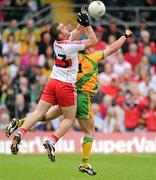 17 July 2011; Emmett McGuckin, Derry, in action against Paddy McGrath, Donegal. Ulster GAA Football Senior Championship Final, Derry v Donegal, St Tiernach's Park, Clones, Co. Monaghan. Picture credit: Brian Lawless / SPORTSFILE