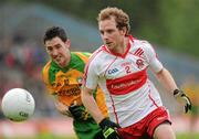 17 July 2011; Sen Leo McGoldrick, Derry, in action against Mark McHugh, Donegal. Ulster GAA Football Senior Championship Final, Derry v Donegal, St Tiernach's Park, Clones, Co. Monaghan. Picture credit: Brian Lawless / SPORTSFILE