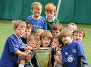 20 July 2011; 'Stars of the future' attending the Volkswagen Leinster Summer Camp at Lansdowne Rugby Club gather around the Heineken Cup. Lansdowne Road, Dublin. Picture credit: Ray McManus / SPORTSFILE