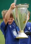 20 July 2011; Six year old John Maguire, from Kilmacud, Dublin, holds aloft the Heineken Cup during the Volkswagen Leinster Summer Camp, Lansdowne Rugby Club, Lansdowne Road, Dublin. Picture credit: Ray McManus / SPORTSFILE