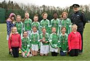 16 February 2017; The girls' champions from Greenlane National School Clontarf with Chief Barry O'Brien, based in Ballymun Garda Station, during an FAI and Garda initiative, run with the cooperation of Dublin City Council, to promote the messages of &quot;Show Racism the Red Card,&quot; anti-bullying, and personal safety. The football blitz involving ten local schools, FAI Project Futsal Ballymun and the FAI Transition Year, took place at the Alfie Byrne Road All-Weather Pitch in Clontarf, Dublin. Photo by Cody Glenn/Sportsfile