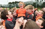 16 February 2017; Charlie Ennis is lifted shoulder high by his St Brigid's Boys National School Killester team-mates after their finals victory during an FAI and Garda initiative, run with the cooperation of Dublin City Council, to promote the messages of &quot;Show Racism the Red Card,&quot; anti-bullying, and personal safety. The football blitz involving ten local schools, FAI Project Futsal Ballymun and the FAI Transition Year, took place at the Alfie Byrne Road All-Weather Pitch in Clontarf, Dublin. Photo by Cody Glenn/Sportsfile