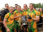 17 July 2011; Anthony Thompson, Ryan Bradley, Neil Gallagher and Neil McGee, Donegal, with the cup after the game. Ulster GAA Football Senior Championship Final, Derry v Donegal, St Tiernach's Park, Clones, Co. Monaghan. Picture credit: Oliver McVeigh / SPORTSFILE