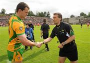 17 July 2011; Donegal Captain Michael Murphy shakes hands with Referee Maurice Deegan. Ulster GAA Football Senior Championship Final, Derry v Donegal, St Tiernach's Park, Clones, Co. Monaghan. Picture credit: Oliver McVeigh / SPORTSFILE