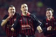 15 February 2002; Dave Morrison of Bohemians celebrates with team-mates Stephen Caffrey, left and Trevor Molloy during the eircom League Premier Division match between Bohemians and Shamrock Rovers at Dalymount Park in Dublin. Photo by David Maher/Sportsfile