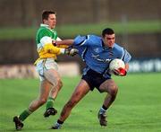 23 February 2002; Paul Casey of Dublin in action against Pascal Kelleghan of Offaly during the Allianz National Football League Division 1A match between Offaly and Dublin at O'Connor Park in Tullamore, Offaly. Photo by Brian Lawless/Sportsfile