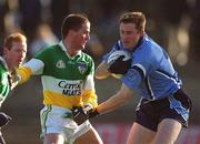 23 February 2002; Coman Goggins of Dublin in action against Donie Claffey of Offaly during the Allianz National Football League Division 1A match between Offaly and Dublin at O'Connor Park in Tullamore, Offaly. Photo by Brian Lawless/Sportsfile