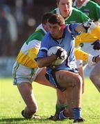 23 February 2002; David Henry of Dublin in action against Donie Claffey of Offaly during the Allianz National Football League Division 1A match between Offaly and Dublin at O'Connor Park in Tullamore, Offaly. Photo by Brian Lawless/Sportsfile