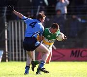23 February 2002; Donie Claffey of Offaly in action against Coman Goggins of Dublin during the Allianz National Football League Division 1A match between Offaly and Dublin at O'Connor Park in Tullamore, Offaly. Photo by Brian Lawless/Sportsfile