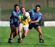 23 February 2002; Barry Mooney of Offaly in action against Dublin's Paul Casey, left, and Senan Connell during the Allianz National Football League Division 1A match between Offaly and Dublin at O'Connor Park in Tullamore, Offaly. Photo by Brian Lawless/Sportsfile