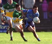 23 February 2002; Alan Brogan of Dublin in action against Karl Slattery of Offaly during the Allianz National Football League Division 1A match between Offaly and Dublin at O'Connor Park in Tullamore, Offaly. Photo by Brian Lawless/Sportsfile