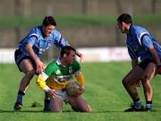 23 February 2002; Barry Mooney of Offaly in action against Dublin's John McNally, left, and Paul Casey during the Allianz National Football League Division 1A match between Offaly and Dublin at O'Connor Park in Tullamore, Offaly. Photo by Brian Lawless/Sportsfile