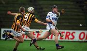 25 February 2002; Paul Flynn of Waterford in action against Kilkenny's Aidan Cummins, centre, and Paul Cahill during the Allianz National Hurling League Division 1A Round 1 match between Kilkenny and Waterford at Nowlan Park in Kilkenny. Photo by Damien Eagers/Sportsfile