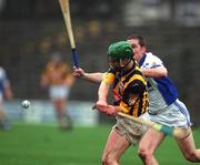 25 February 2002; Richie Mullally of Waterford in action against Kilkenny's Ken McGrath during the Allianz National Hurling League Division 1A Round 1 match between Kilkenny and Waterford at Nowlan Park in Kilkenny. Photo by Damien Eagers/Sportsfile