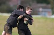 26 February 2002; Brian O'Driscoll is tackled by Shane Horgan during Ireland Rugby squad training at Dr Hickey Park in Greystones, Wicklow. Photo by Matt Browne/Sportsfile