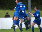 27 February 2002; Limerick's Brian Donnellan, left, celebrates with team-mates Brendan Hughes and Shane O'Donoghue after scoring his side's winning goal during the eircom League Cup Semi-Final match between Limerick and Shamrock Rovers at Jackman Park in Limerick. Photo by David Maher/Sportsfile