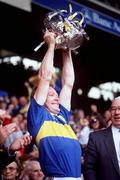 3 September 1989; Tipperary captain Bobby lifts the Liam MacCarthy Cup following his side's victory during the All-Ireland Senior Hurling Championship Final match between Tipperary and Antrim at Croke Park in Dublin. Photo by Ray McManus/Sportsfile