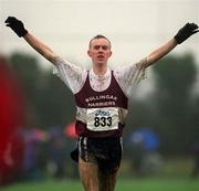24 February 2002; Mark Christie of Mullingar Harriers AC celebrates as he crosses the line to win the Junior Men's race during the Inter Club Cross Country Championships of Ireland at the ALSAA Complex in Dublin. Photo by Ray Lohan/Sportsfile