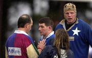 9 February 2002; Peter Smyth of St Mary's College is asked to leave the field by referee Dave McHugh, in the presence of team-mate Malcolm O'Kelly and team physio Cathy Tyndall during the AIB All-Ireland League match between Garryowen and St Mary's College at Dooradoyle in Limerick. Photo by Brendan Moran/Sportsfile