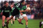 2 March 2002; Aidan Higgins of Charlestown Sarsfield is tackled by John Coogan of Nemo Rangers during the AIB GAA Football All-Ireland Senior Club Championship Semi-Final match between Nemo Rangers and Charlestown Sarsfield at McDonagh Park in Nenagh, Tipperary. Photo by Damien Eagers/Sportsfile