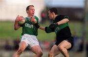2 March 2002; David Tiernan of Charlestown Sarsfield is tackled by Sean O'Brien of Nemo Ranger during the AIB GAA Football All-Ireland Senior Club Championship Semi-Final match between Nemo Rangers and Charlestown Sarsfield at McDonagh Park in Nenagh, Tipperary. Photo by Damien Eagers/Sportsfile