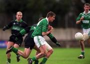 2 March 2002; Oliver Conway of Charlestown  tussles for possession with Niall Geary of Nemo Rangers during the AIB GAA Football All-Ireland Senior Club Championship Semi-Final match between Nemo Rangers and Charlestown Sarsfield at McDonagh Park in Nenagh, Tipperary. Photo by Damien Eagers/Sportsfile