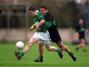 2 March 2002; Paul Mulligan of Charlestown Sarsfield races clear of Garry Murphy of Nemo Rangers during the AIB GAA Football All-Ireland Senior Club Championship Semi-Final match between Nemo Rangers and Charlestown Sarsfield at McDonagh Park in Nenagh, Tipperary. Photo by Damien Eagers/Sportsfile