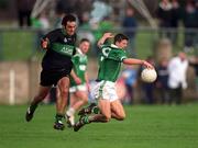 2 March 2002; Aidan Higgins of Charlestown Sarsfield is tackled by John Coogan of Nemo Rangers during the AIB GAA Football All-Ireland Senior Club Championship Semi-Final match between Nemo Rangers and Charlestown Sarsfield at McDonagh Park in Nenagh, Tipperary. Photo by Damien Eagers/Sportsfile