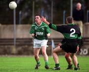 2 March 2002; Padraic Horkan of Charlestown Sarsfield is tackled by Larry Kavanagh od Nemo Rangers during the AIB GAA Football All-Ireland Senior Club Championship Semi-Final match between Nemo Rangers and Charlestown Sarsfield at McDonagh Park in Nenagh, Tipperary. Photo by Damien Eagers/Sportsfile