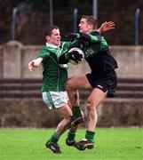 2 March 2002; Niall Geary of Nemo Rangers is tackled by Paul Mulligan of Charlestown Sarsfield during the AIB GAA Football All-Ireland Senior Club Championship Semi-Final match between Nemo Rangers and Charlestown Sarsfield at McDonagh Park in Nenagh, Tipperary. Photo by Damien Eagers/Sportsfile