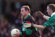 2 March 2002; Stephen O'Brien of Nemo Rangers in action against Mark Caffrey of Charlestown Sarsfields during the AIB GAA Football All-Ireland Senior Club Championship Semi-Final match between Nemo Rangers and Charlestown Sarsfield at McDonagh Park in Nenagh, Tipperary. Photo by David Maher/Sportsfile
