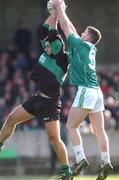 2 March 2002; John Coogan of Nemo Rangers in action against Dermot Higgins of Charlestown Sarsfields during the AIB GAA Football All-Ireland Senior Club Championship Semi-Final match between Nemo Rangers and Charlestown Sarsfield at McDonagh Park in Nenagh, Tipperary. Photo by David Maher/Sportsfile