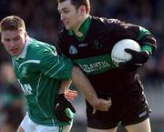 2 March 2002; Maurice McCarthy of Nemo Rangers in action against Dermot Higgins of Charlestown Sarsfields during the AIB GAA Football All-Ireland Senior Club Championship Semi-Final match between Nemo Rangers and Charlestown Sarsfield at McDonagh Park in Nenagh, Tipperary. Photo by David Maher/Sportsfile