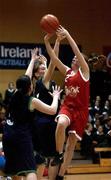 4 March 2002; Miriam Walsh of Glanmire Community College in action against Loreto Beaufort's Aoife McCormick, left, and Laura Muldowey during the Cadbury's Timeout All-Ireland Girls Cadette 'B' Final match between Loreto Beaufort, Dublin, and Glanmire Community College, Cork, at the ESB Arena in Tallaght, Dublin. Photo by Brendan Moran/Sportsfile