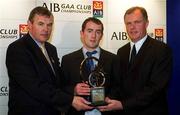 4 March 2002; Alistair Elliot of Dunloy, Ulster Hurling Award Winner, centre, with Uachtarán Chumann Lœthchleas Gael Sean McCague, left, and Managing Director of AIB Eugene Sheehy, during the AIB GAA Provincial Player of the Year Awards 2001 at AIB Bankcentre in Ballsbridge, Dublin. Photo by Ray McManus/Sportsfile
