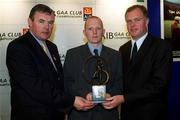 4 March 2002; Tommy Gill of Rathnew, Leinster Football Award Winner, centre, with Uachtarán Chumann Lœthchleas Gael Sean McCague, left, and Managing Director of AIB Eugene Sheehy, during the AIB GAA Provincial Player of the Year Awards 2001 at AIB Bankcentre in Ballsbridge, Dublin. Photo by Ray McManus/Sportsfile