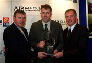 4 March 2002; Colin Corkery of Nemo Rangers, Munster Football Award Winner, centre, with Uachtarán Chumann Lœthchleas Gael Sean McCague, left, and Managing Director of AIB Eugene Sheehy, during the AIB GAA Provincial Player of the Year Awards 2001 at AIB Bankcentre in Ballsbridge, Dublin. Photo by Ray McManus/Sportsfile