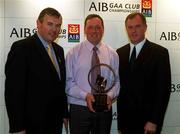 4 March 2002; Matty Foley of Buffers Alley, winner of the Coaching and Games Development Award, centre, with Uachtarán Chumann Lœthchleas Gael Sean McCague, left, and Managing Director of AIB Eugene Sheehy, during the AIB GAA Provincial Player of the Year Awards 2001 at AIB Bankcentre in Ballsbridge, Dublin. Photo by Ray McManus/Sportsfile