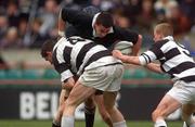 4 March 2002; Cathal Harrington of Cistercian College Roscrea is tackled by Richard Leyten, left, and Mark Broe of Belvedere College, during the Leinster Schools Senior Cup Semi-Final match between Belvedere College and Cistercian College Roscrea at Lansdowne Road in Dublin. Photo by Damien Eagers/Sportsfile
