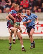 3 March 2002; Michael Ennis of Westmeath is tackled by Declan Darcy of Dublin during the Allianz National Football League Division 1A Round 4 match between Dublin and Westmeath at Parnell Park in Dublin. Photo by Ray McManus/Sportsfile