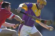 9 March 2002; Michael Jordan of Wexford in action against Mark Prendergast of Cork during the Allianz National Hurling League Division 1B Round 2 match between Cork and Wexford at Páirc U’ Chaoimh in Cork. Photo by Brendan Moran/Sportsfile