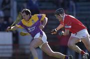 9 March 2002; Adrian Fenlon of Wexford in action against John Browne of Cork during the Allianz National Hurling League Division 1B Round 2 match between Cork and Wexford at Páirc U’ Chaoimh in Cork. Photo by Brendan Moran/Sportsfile