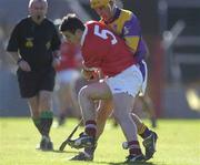 9 March 2002; Derek Barrett of Cork in action against Rory McCarthy of Wexford during the Allianz National Hurling League Division 1B Round 2 match between Cork and Wexford at Páirc U’ Chaoimh in Cork. Photo by Brendan Moran/Sportsfile